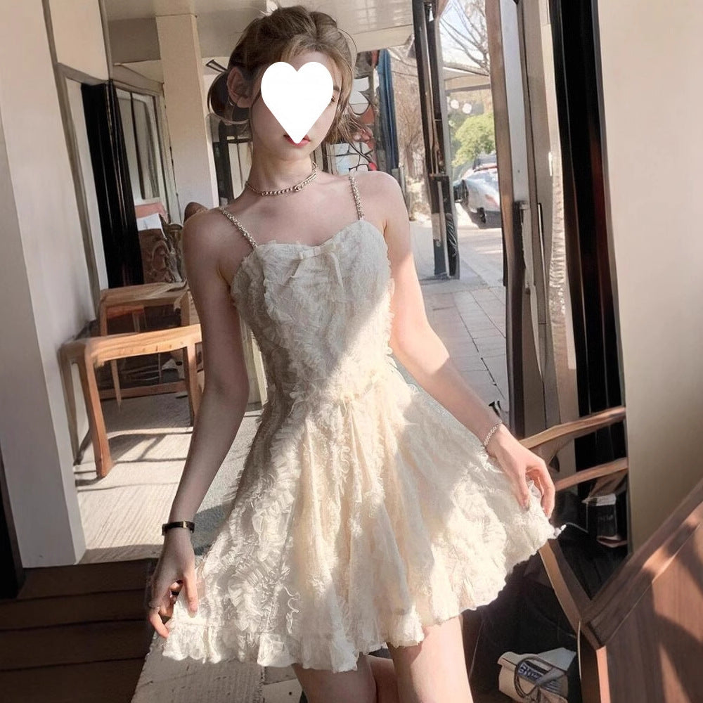 2025 summer new temperament high-end diamond chain feather suspender dress women's clothing waist slim skirt