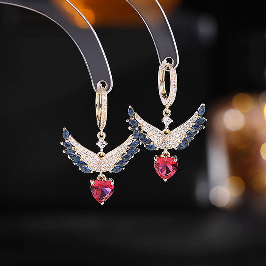2025 Sweet and fresh girlish temperament earrings, slightly inlaid zircon earrings, niche design, angel wings, love ear buckles.