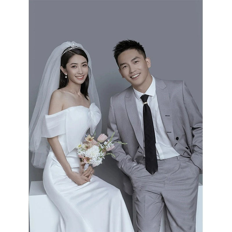 2025 New one-word shoulder light wedding dress bow fishtail skirt simple wedding dress couple photo theme photo dress