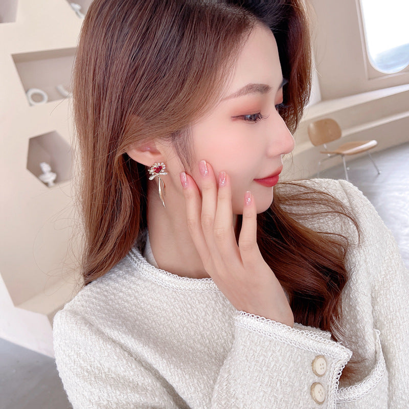 2025 Korean version of fresh temperament sweet girl heart earrings zircon stud earrings s925 silver needle streamer bow love earrings