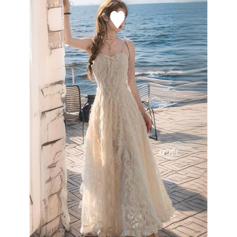 2025 summer new temperament high-end diamond chain feather suspender dress women's clothing waist slim skirt