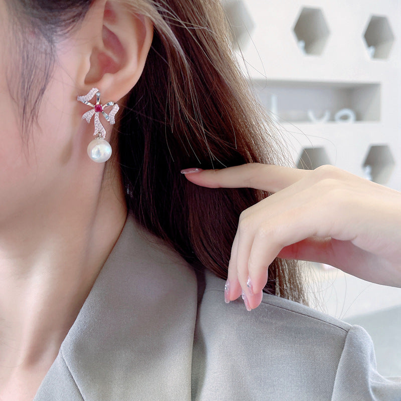 2025 South Korea Dongdaemun new earrings Internet celebrity temperament versatile earrings s925 silver needle streamer bow pearl earrings