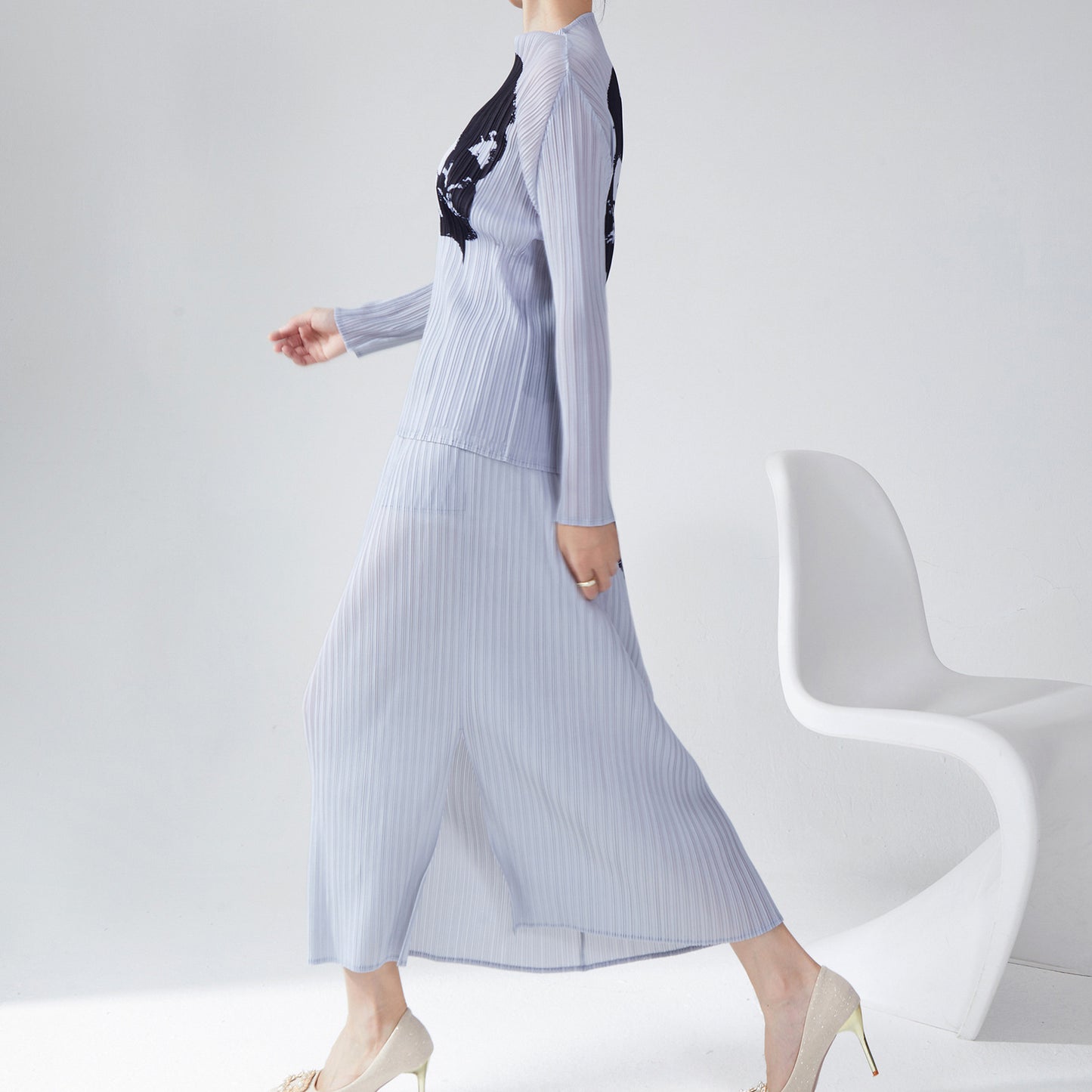 2025 counter women's clothing spring and summer new suit printed loose long-sleeved T-shirt top split skirt two-piece set