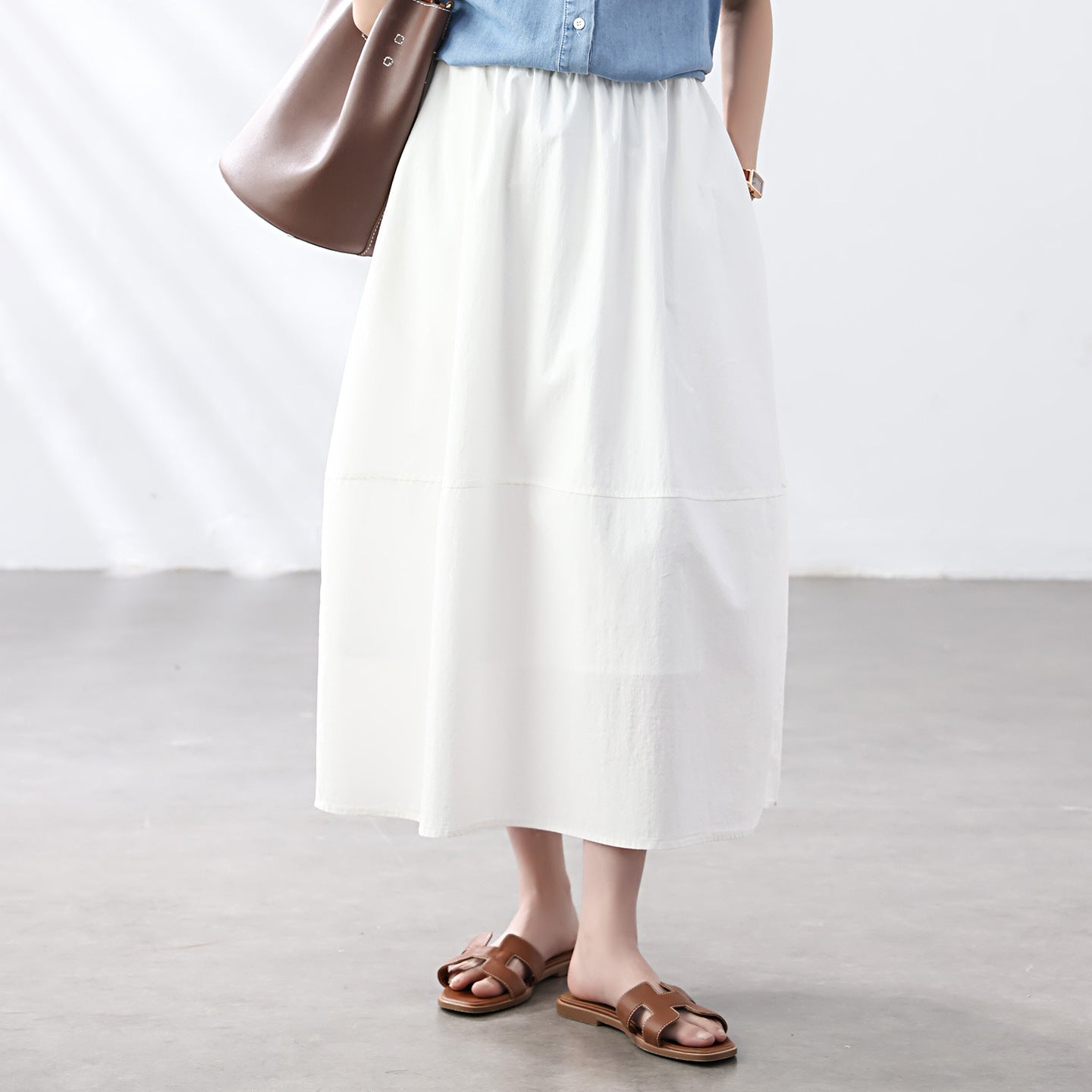 Cotton cocoon, Korean version of Hepburn style high waist and thin A-shaped umbrella skirt, summer drape solid color bud half-length skirt women