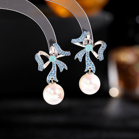 2025 South Korea Dongdaemun new earrings Internet celebrity temperament versatile earrings s925 silver needle streamer bow pearl earrings