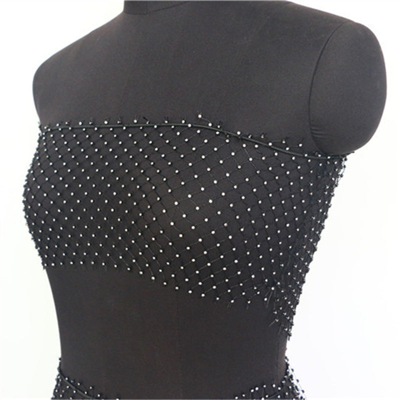 2025  YL2217  factory direct hair Popular trade supply fashionable hollow mesh fishing net clothes small vest skirt set