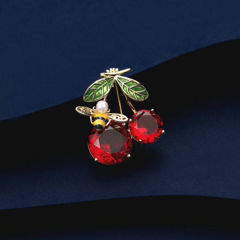 2025 Korean version of fashion temperament suit collar pin fixed clothes pin dripping oil little bee zircon inlaid red cherry brooch