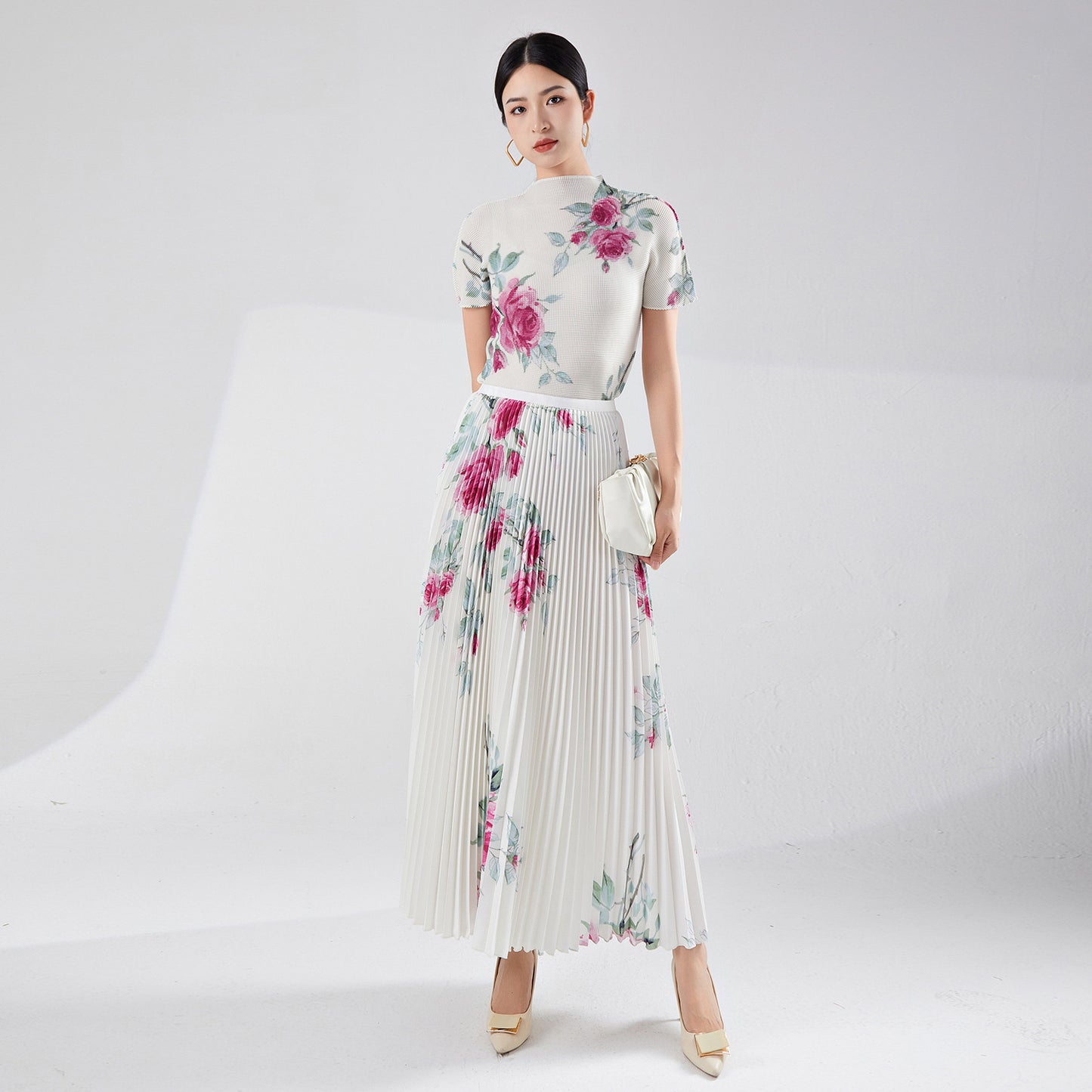 2025 Fashion suit Women's clothing High-end summer suit Printed short-sleeved top Half skirt temperament pleated two-piece set Popularan goods