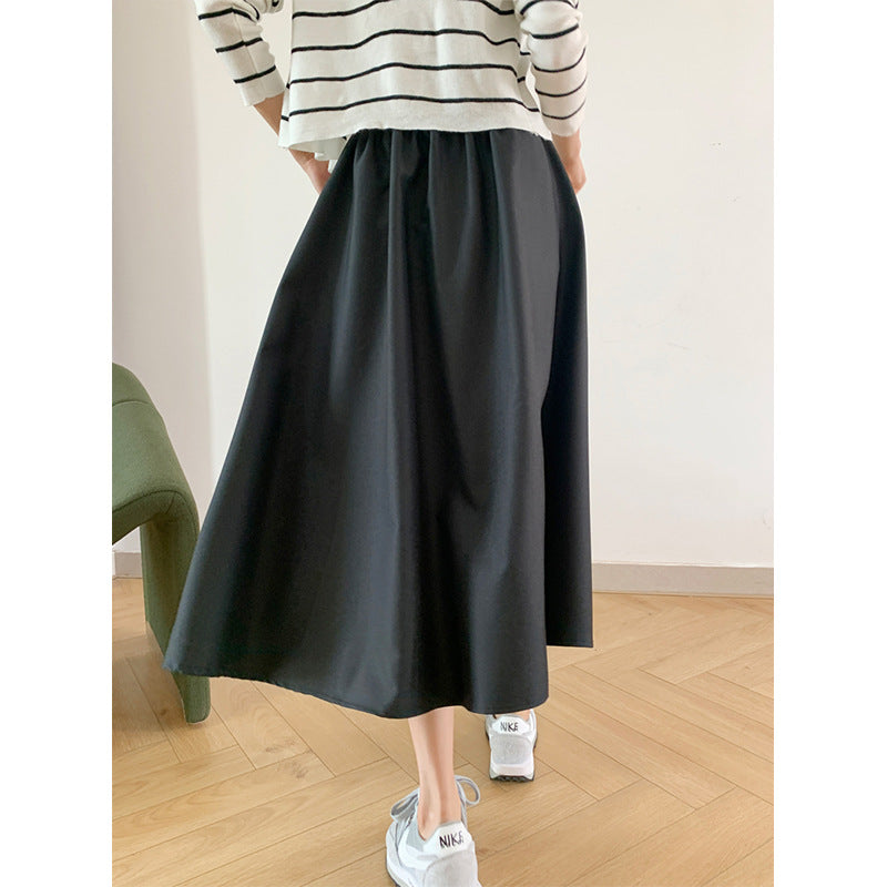 2025 autumn solid color skirt simple female Korean version black high waist thin big skirt A word umbrella skirt 21039