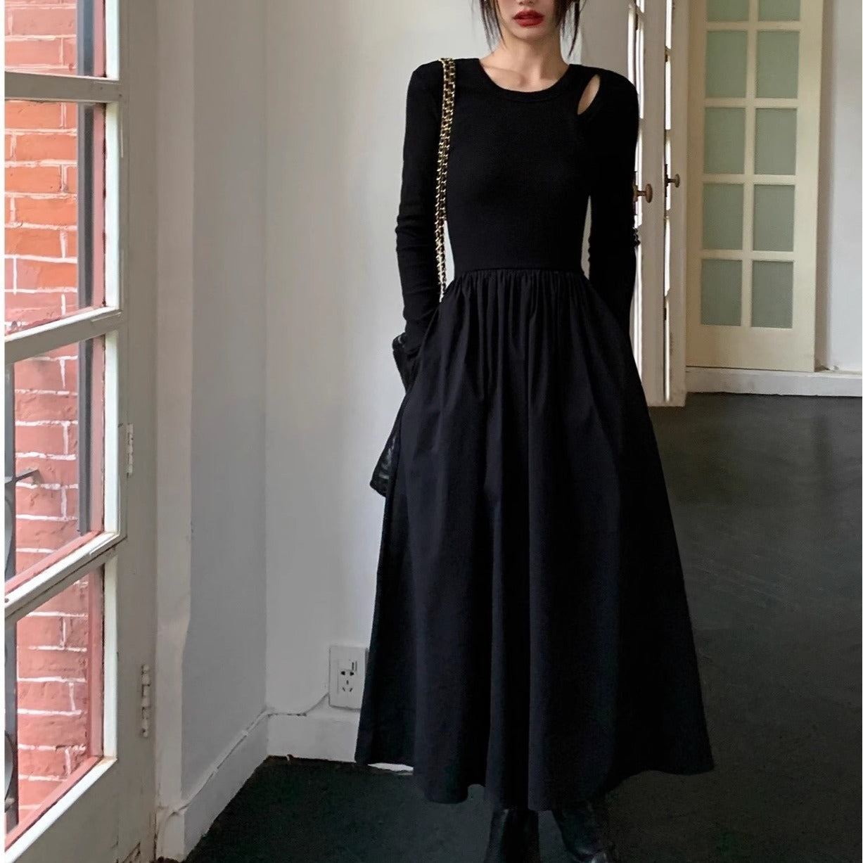 2025 Hepburn style hollow knitted long-sleeved dress women's spring and autumn new design sense niche temperament slim and thin long dress