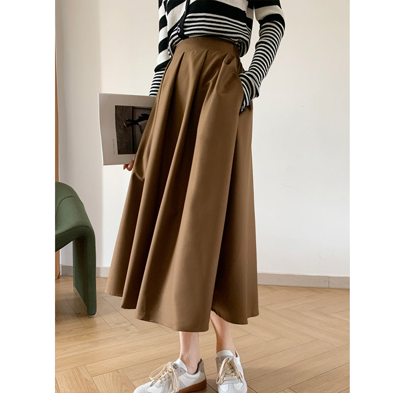2025 autumn solid color skirt simple female Korean version black high waist thin big skirt A word umbrella skirt 21039