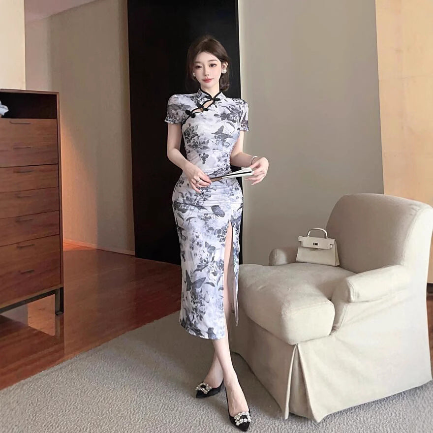 Chinese-style improved cheongsam women's 2025 summer dress new young pure desire sexy tight hip-wrapped split short-sleeved dress