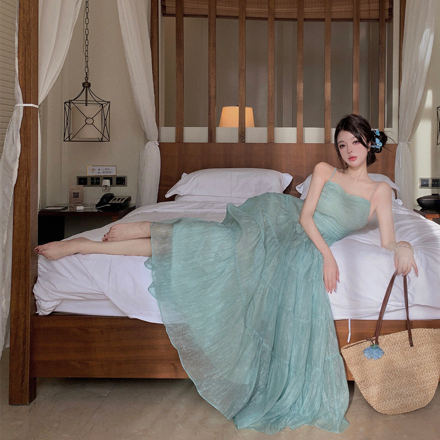 2025 Beautiful seaside vacation photo high-end waist method beach halter big skirt suspender a word long dress