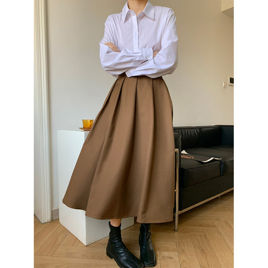 2025 autumn solid color skirt simple female Korean version black high waist thin big skirt A word umbrella skirt 21039