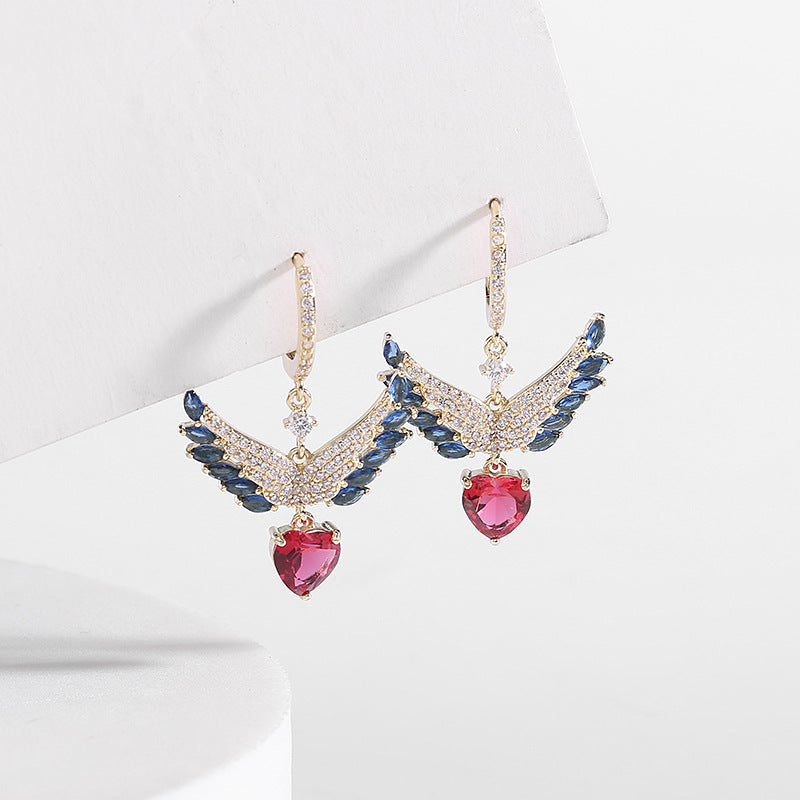 2025 Sweet and fresh girlish temperament earrings, slightly inlaid zircon earrings, niche design, angel wings, love ear buckles.