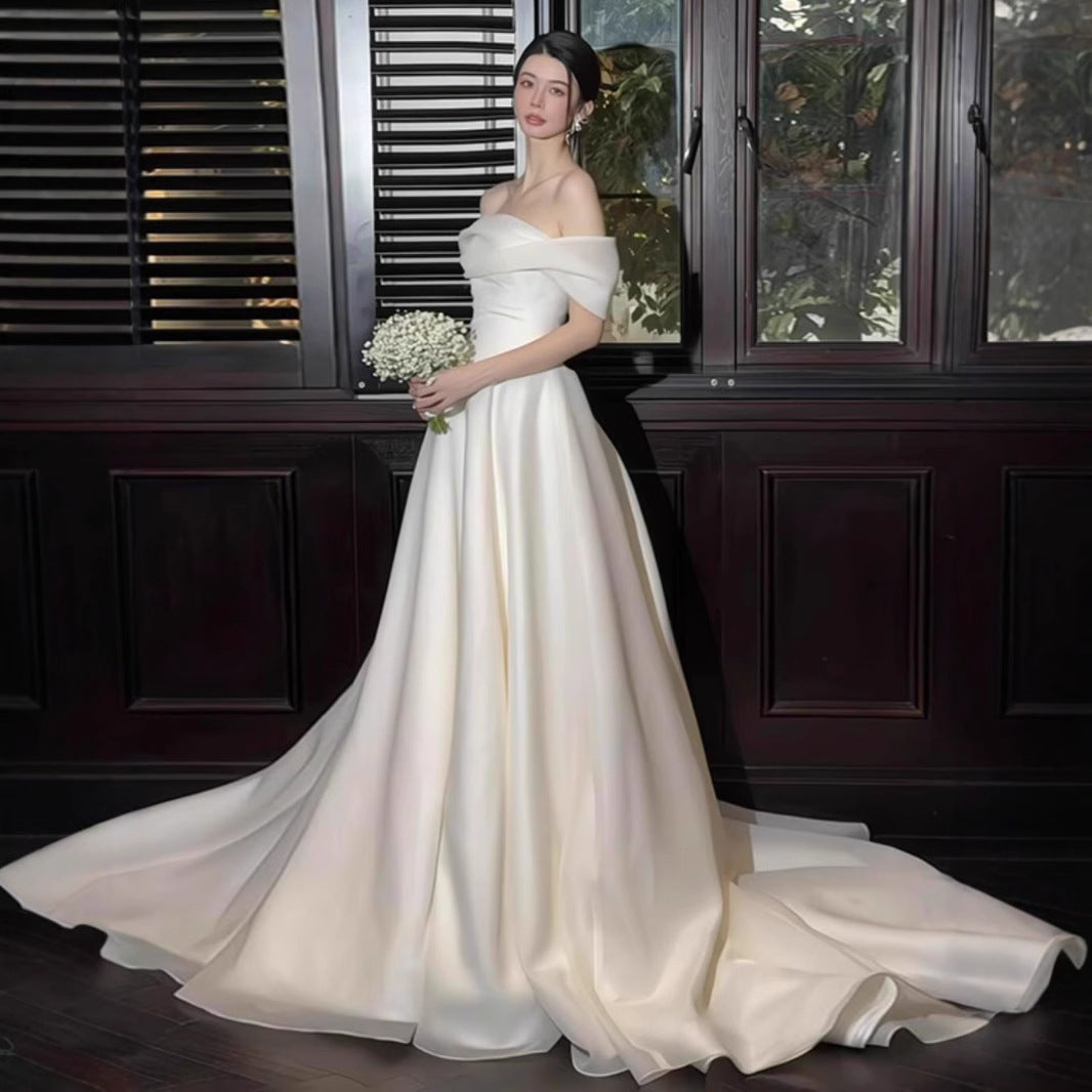 2025 one-word shoulder light wedding dress simple light luxury high-end bride Mori super fairy dress trailing to welcome guests out of the house
