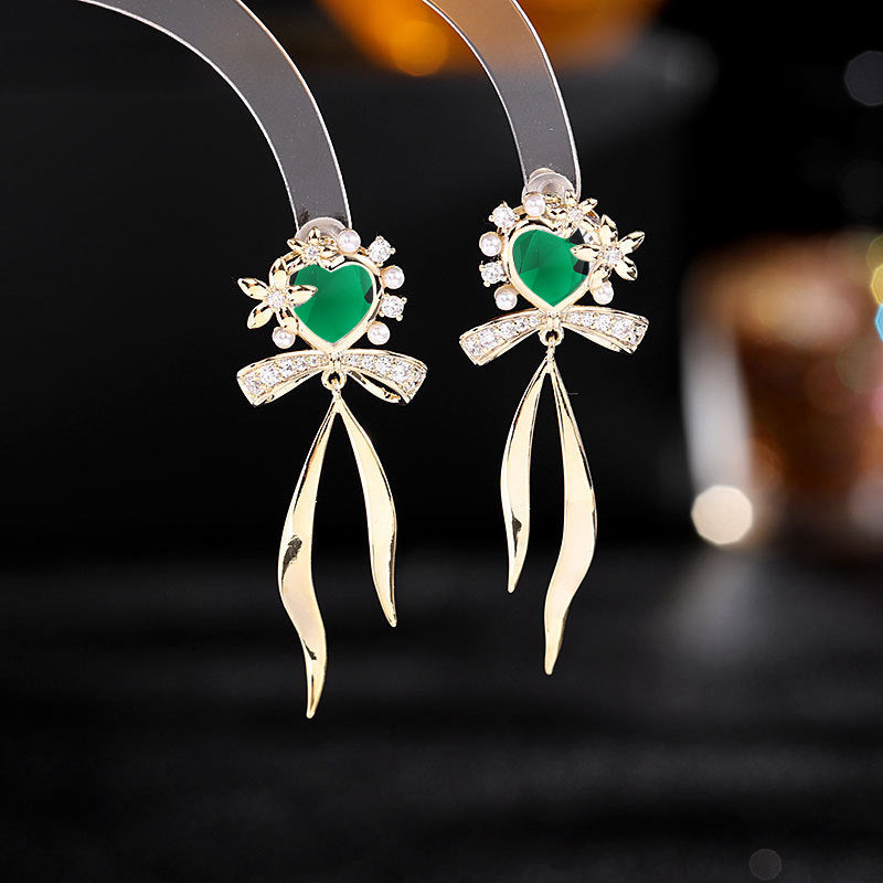 2025 Korean version of fresh temperament sweet girl heart earrings zircon stud earrings s925 silver needle streamer bow love earrings
