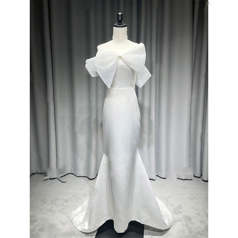 2025 New one-word shoulder light wedding dress bow fishtail skirt simple wedding dress couple photo theme photo dress