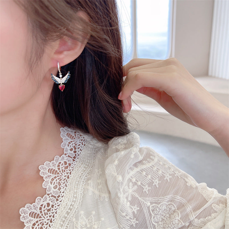 2025 Sweet and fresh girlish temperament earrings, slightly inlaid zircon earrings, niche design, angel wings, love ear buckles.