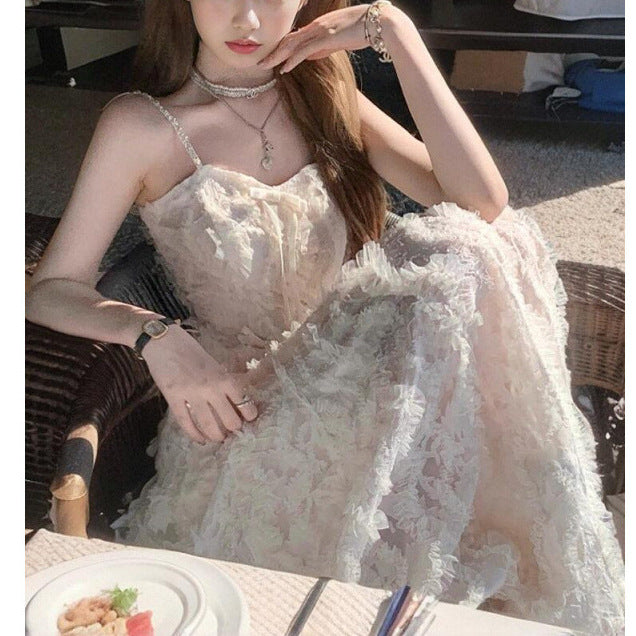 2025 summer new temperament high-end diamond chain feather suspender dress women's clothing waist slim skirt