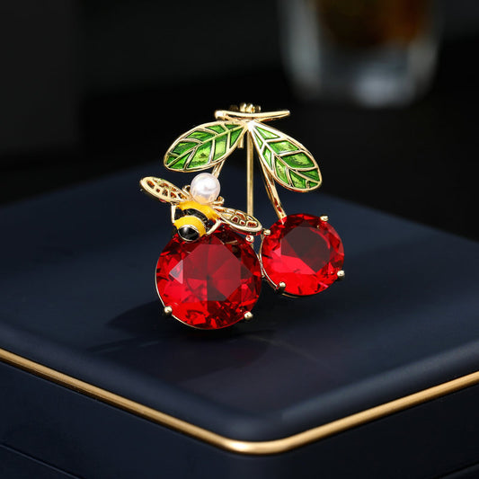 2025 Korean version of fashion temperament suit collar pin fixed clothes pin dripping oil little bee zircon inlaid red cherry brooch