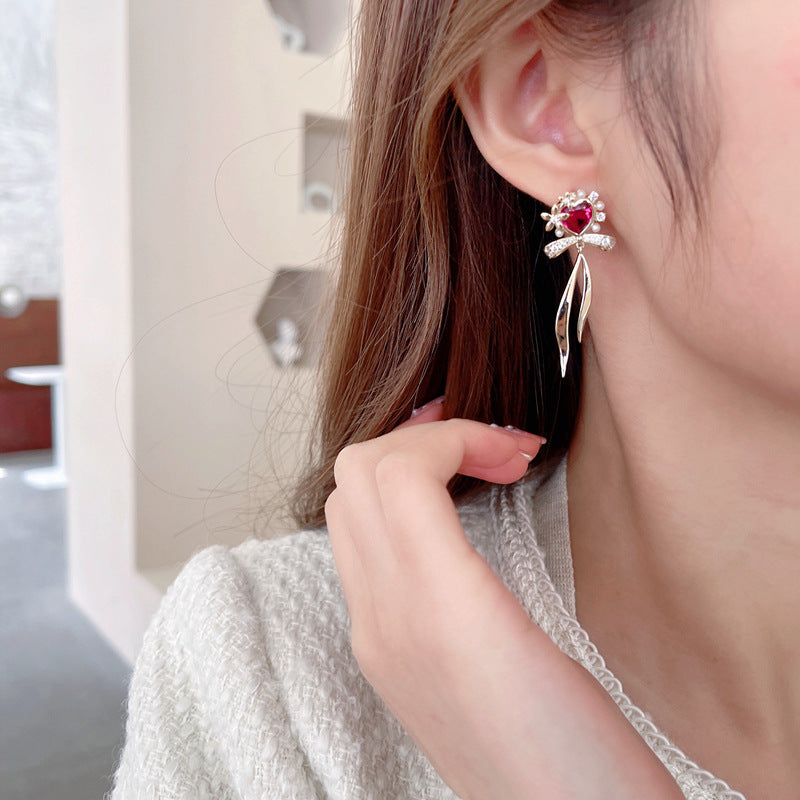 2025 Korean version of fresh temperament sweet girl heart earrings zircon stud earrings s925 silver needle streamer bow love earrings