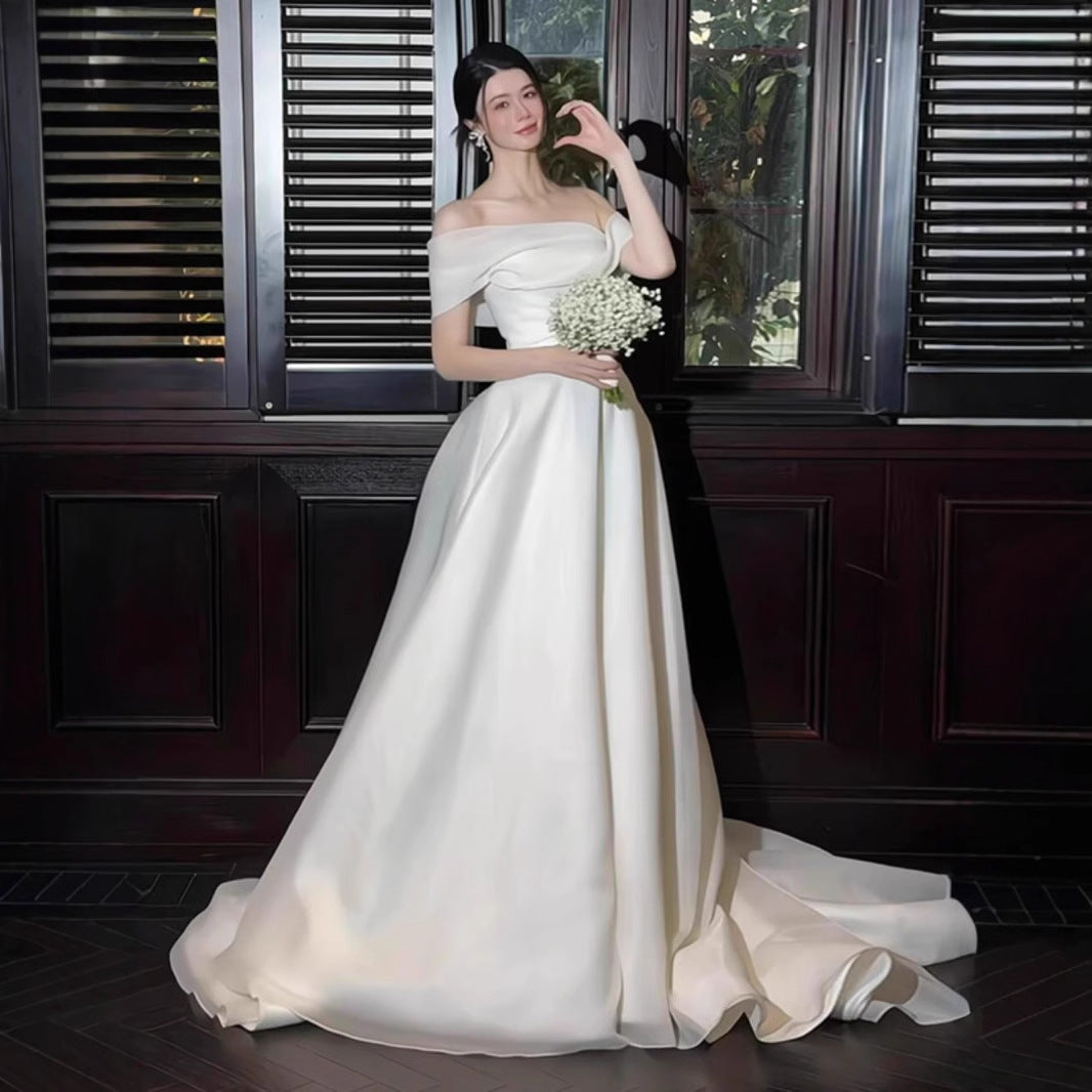 2025 one-word shoulder light wedding dress simple light luxury high-end bride Mori super fairy dress trailing to welcome guests out of the house