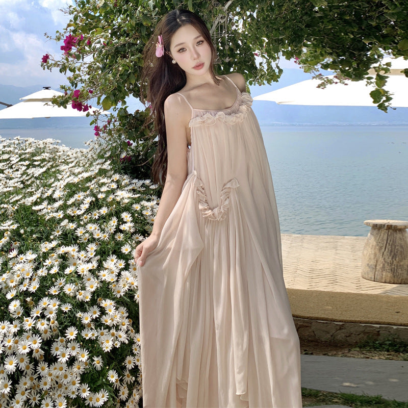 2025 Seaside Banna vacation dress super fairy high-end design naked pink fungus edge halter suspender big swing dress