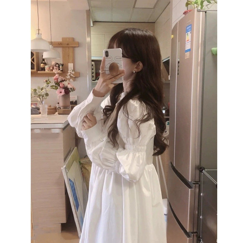 2025 White dress women's small spring and summer  new  design temperament long sleeve lisianthus long skirt