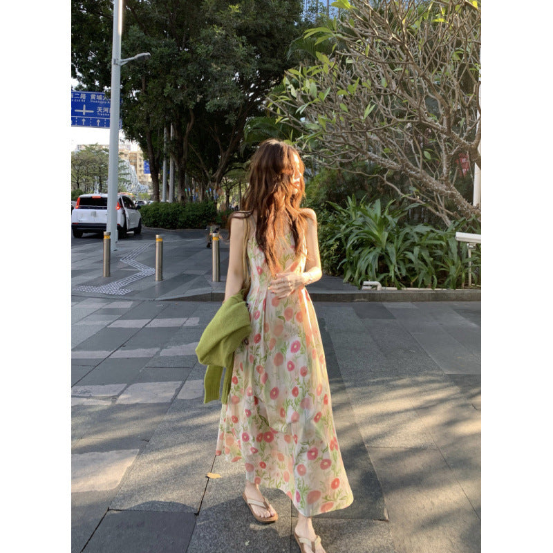 2025 spring and summer new outing travel wear Korean version of pure desire floral dress women's thin suspender skirt
