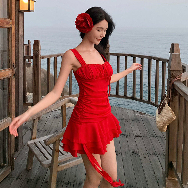 2025 beautiful red suspender dress women's summer small irregular design sexy seaside vacation skirt