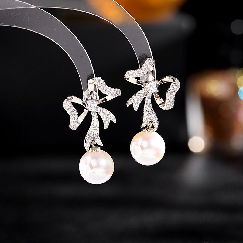 2025 South Korea Dongdaemun new earrings Internet celebrity temperament versatile earrings s925 silver needle streamer bow pearl earrings