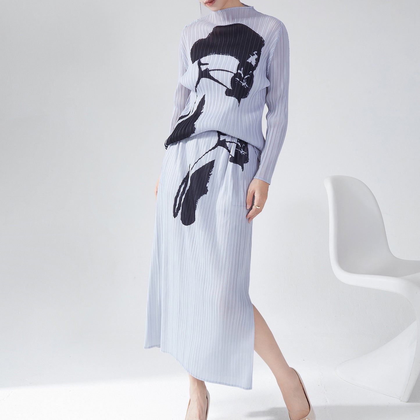 2025 counter women's clothing spring and summer new suit printed loose long-sleeved T-shirt top split skirt two-piece set
